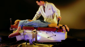 This is a picture of Cox Technic chiropratic spinal manipulation as performed at Gormish Chiropractic & Rehabilitation.